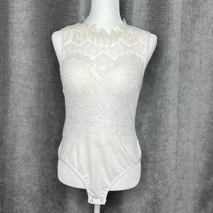 White sleeveless white lace bodysuit